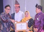 Bupati Bengkalis Kasmarni Terima Sertifikat Kemenkes atas Prestasi Bengkalis Bebas dari Frambusia