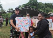 Satgas Yonif 623/BWU Ikut Meramaikan Peringatan 68 Tahun Injil Masuk Ke Tanah Papua Dengan Jalan Santai Di GKI Sion Kumurkek