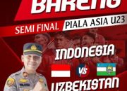 Dukung Timnas, Kapolsek Tapung Hulu Laksanakan Nobar Semifinal Piala AFC U-23 Bersama Masyarakat Desa Kusau Makmur