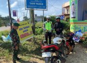 Personel Pos PAM Nilam Sari Ukui Layani Pemudik Dengan Menyiapkan Kompresor Alat Pengisi Angin Gratis