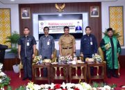 Pj Sekda Kampar Wakili Pj Bupati Kampar Lantik Pejabat Fungsional Pemkab Kampar di Aula Bappeda Kampar