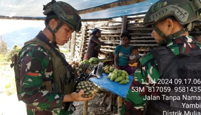 Bantu Perekonomian Warga, Ksatria Buaya Putih 323 Borong Hasil Tani Mama Papua
