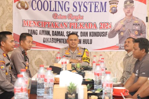 Wujudkan Pilkada 2024 Sejuk, Kapolres Rohul Bergerilya Cooling System Dengan Pendeta HKBP, Katolik Dan Pemdes Ujungbatu Timur