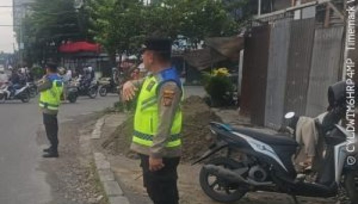 Polsek Sunggal Gelar Pengaturan Lalu Lintas Pagi Hari, Pastikan Aktivitas Warga Berjalan Lancar