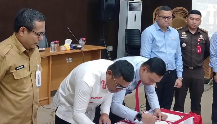 Perkuat Pendampingan Hukum Penyelenggaraan Pemerintahan, Pemkab Pelalawan dan Kejari Tandatangani MoU
