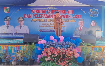 Hadiri Acara Wisuda Tahfizh SMP Negeri Madani, Plt Kadisdik Berharap Lahir Penghafal Alquran Berakhlak Mulia
