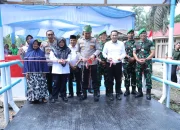Hadiri Peresmian Jembatan Presisi di Merempan Hulu, Bupati Siak Apresiasi Dukungan Polri