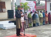 Lurah Teluk Dalam T.Eri Yusri, S.Pd Pimpin Upacara Peringatan Hari Jadi Kabupaten Pelalawan ke-27